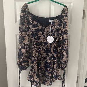 Petal and pup dress. Runs small. Bra like top. Fabric belt around waist.